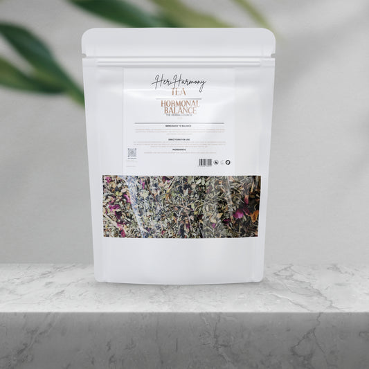 Her Harmony Hormonal Balance herbal tea pouch with visible botanical blend